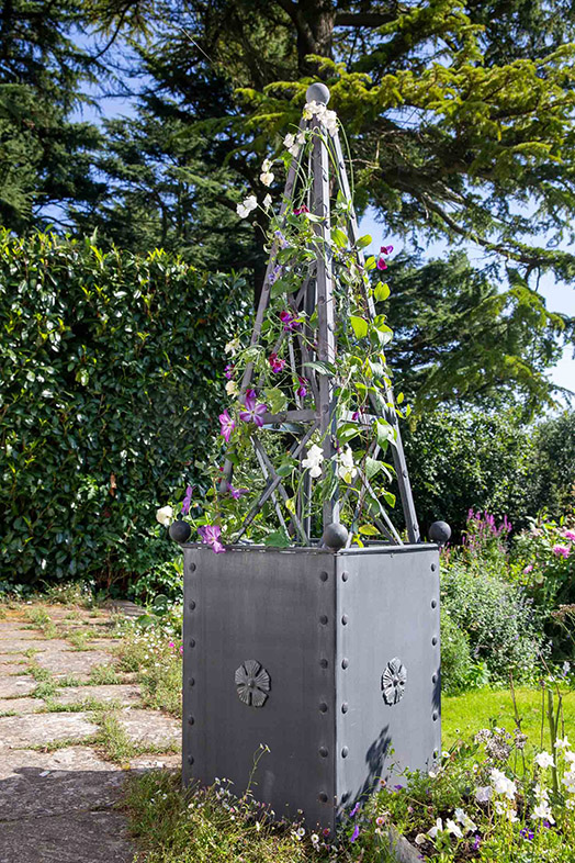 Our small obelisk in an Arthur Jack large garden planter