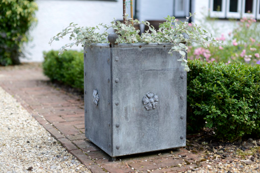 A galvanised steel planter with a zinc coating, perfect for outdoor spaces